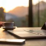 laptop coffee cup phone