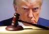 Trump Administration UNLEASHES Constitutional War Against California Gavel in front of a serious mans face.