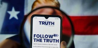 Phone screen displaying Truth Social app magnified