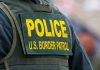 Federal Agents Accused: Oregon’s SHOCKING Legal Move Police U.S. Border Patrol uniform close-up.