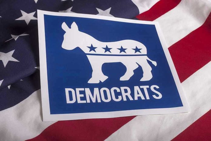 305852213 Democrats logo on American flag background