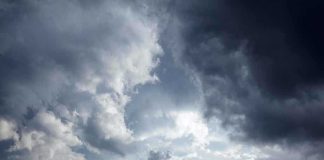 Dramatic clouds in a stormy sky with varying shades of gray