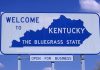 Appalachia Cancer Belt Explodes–Nobody Warned! Welcome sign for Kentucky, the Bluegrass State, with a blue background