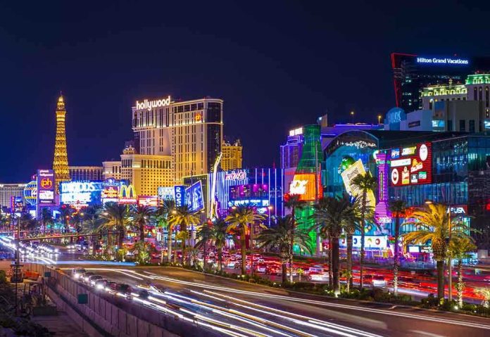 Vibrant view of the Las Vegas Strip at night with neon lights and traffic