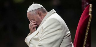 White House WAR With Vatican EXPLODES Pope sitting with his head bowed and hand covering his face