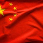 China Front Exposed in Iran Tech Plot Red flag with five yellow stars, Chinas flag.