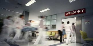 Celebrity Flight Emergency Sparks Media Speculation Storm Medical staff rushing patient on stretcher in emergency room.
