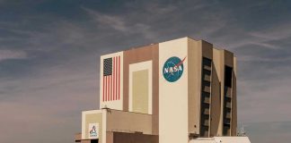 Moon State: It Is Back in America’s Sights NASAs Vehicle Assembly Building with Artemis sign.