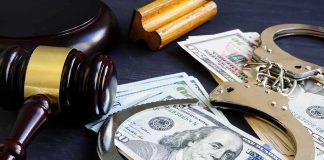 Freezer Corpse Exposes Benefits Blindspot Gavel, handcuffs, and cash on a dark table