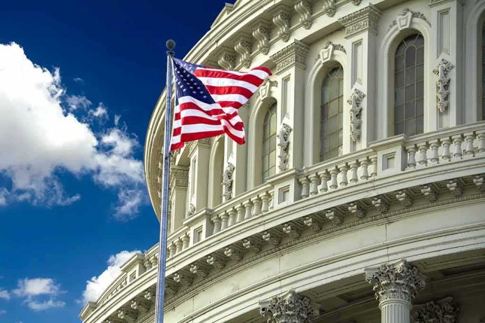 American flag waving before a neoclassical government building