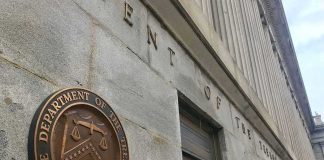 Treasury Doubles Bond Buybacks in $4B Market Move U.S. Treasury building exterior with bronze seal on stone wall