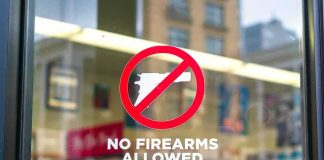 San Francisco Cracks Down on Retail Theft No firearms allowed sign on a store window