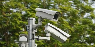 surveillance cameras mounted on a metal pole