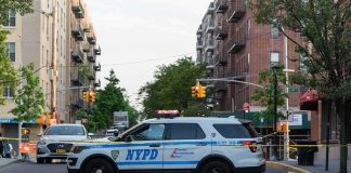 Woman Found Stabbed Inside Luxury Manhattan Co-op NYPD police SUV blocking a city street at a taped-off scene