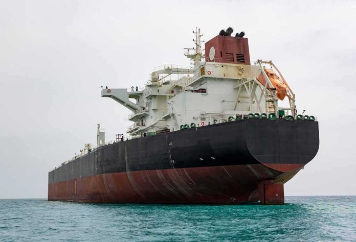 shutterstock_1985991914 Large oil tanker anchored in calm sea