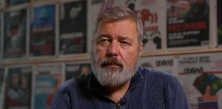 FBI Agent Cornered Inside Cartel Kill Crew Bearded man in a blue sweater sitting indoors