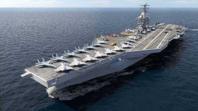 shutterstock_661498807 Aircraft carrier at sea with fighter jets on deck