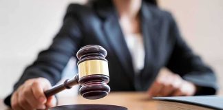 Court Exposes Romania’s Black Site Judge's gavel striking sound block on courtroom desk