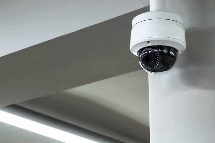 shutterstock_1560086762-1 Dome security camera mounted on a ceiling corner