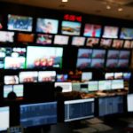 Iran Launches New Missile Barrage, Threatens to End Peace Talks control room with multiple screens and monitors