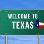 Texas Is No Longer a Republican Lock Welcome to Texas road sign with a Texas map