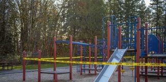 Police Search for Missing 13-Year-Old and 19-Year-Old Man Playground equipment wrapped with caution tape
