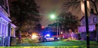 Houston Mother Accused in Daughter’s Death Police car blocks residential street at night behind caution tape