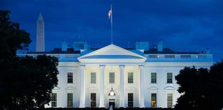 Russia Gets a Break as Fuel Costs Surge White House illuminated at dusk with flagpole and columns