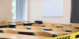 Florida Substitute Accused of Kicking Student Empty classroom with police tape across desks