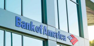 Barber Returns $128K Found on ATM Bank of America branch exterior with logo on glass building